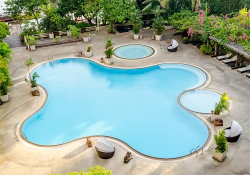 The view of swimming pool in hotel The view of swimming pool in hotel